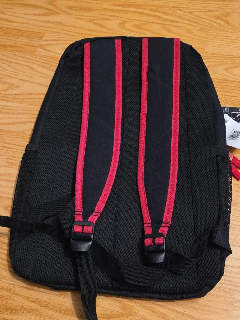 Puma Black Backpack with Pink Accents and Holographic Logo